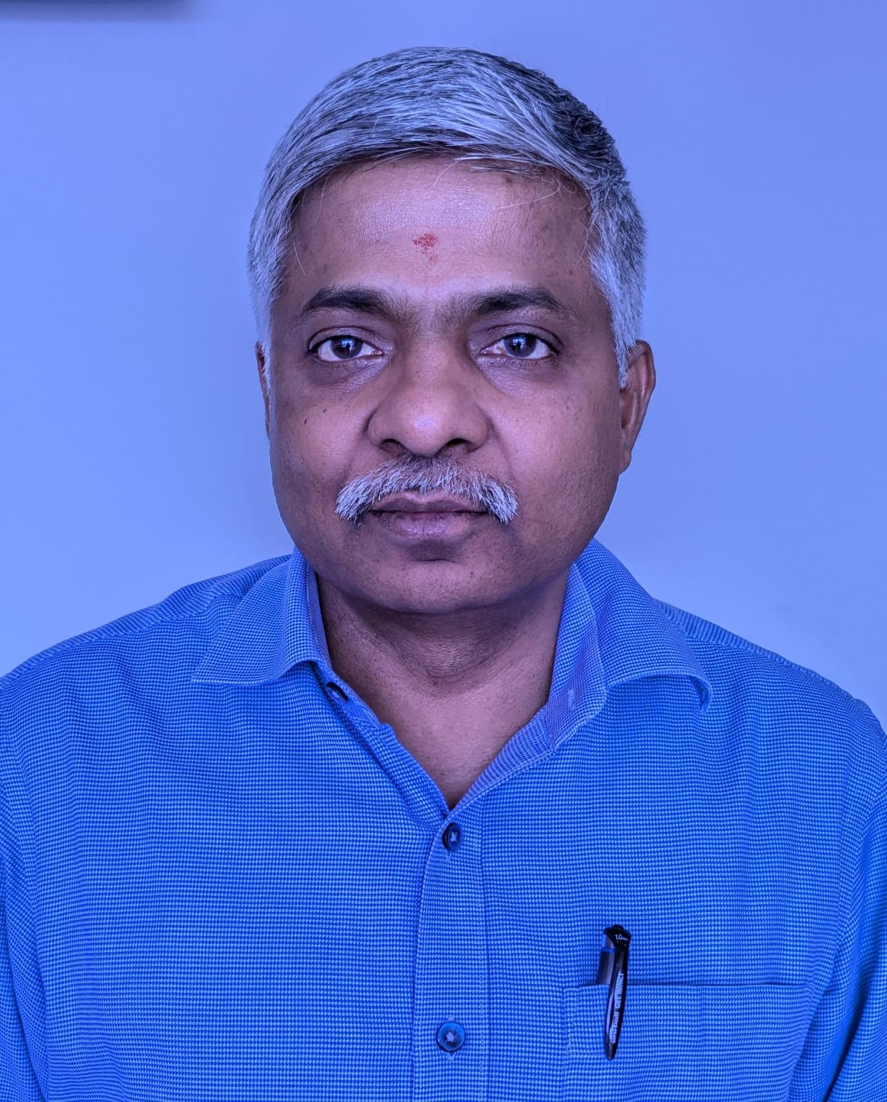 Shri Dr. V. Candavelou, IAS