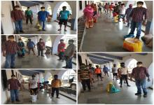27-Apr-2020 Report 1: Distribution of dry ration to needy migrants at Pedem, Mapusa, North Goa